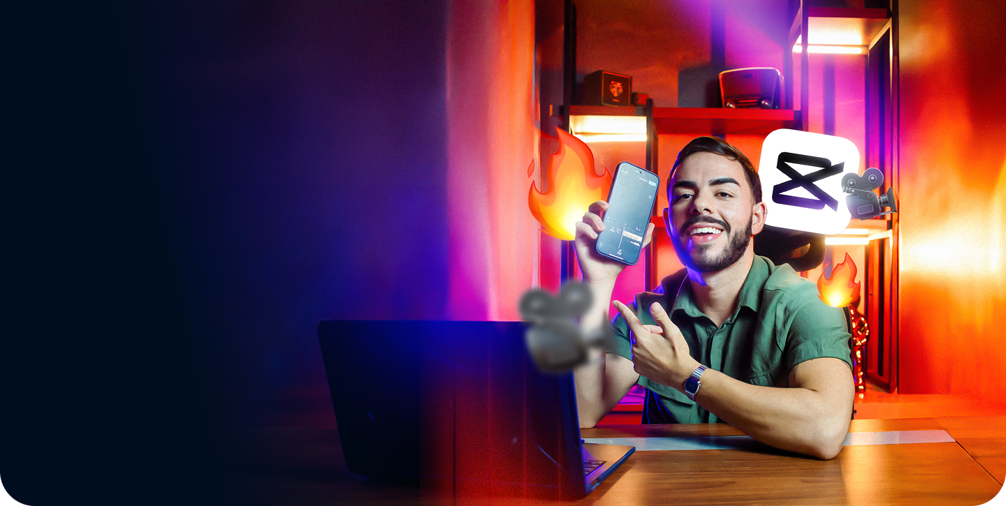 Allan, o criador do curso, segurando um celular